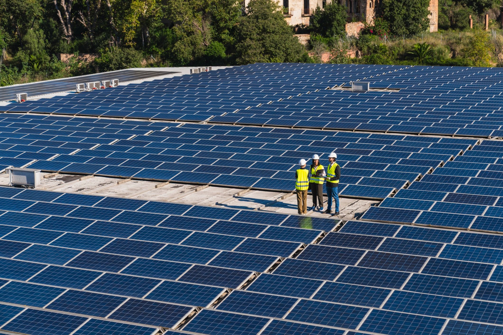 solar energy professionals team rooftop panels